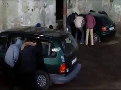 Redhead hostage fucked by two muscular guards